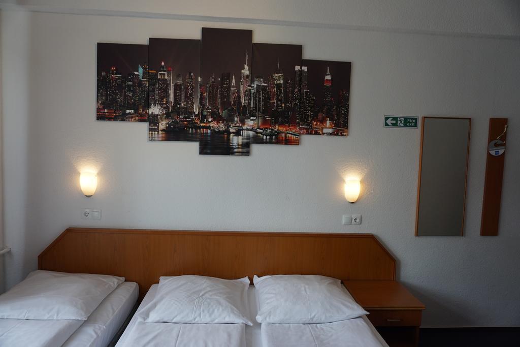 Itm Hotel Oase Hamburgo Quarto foto